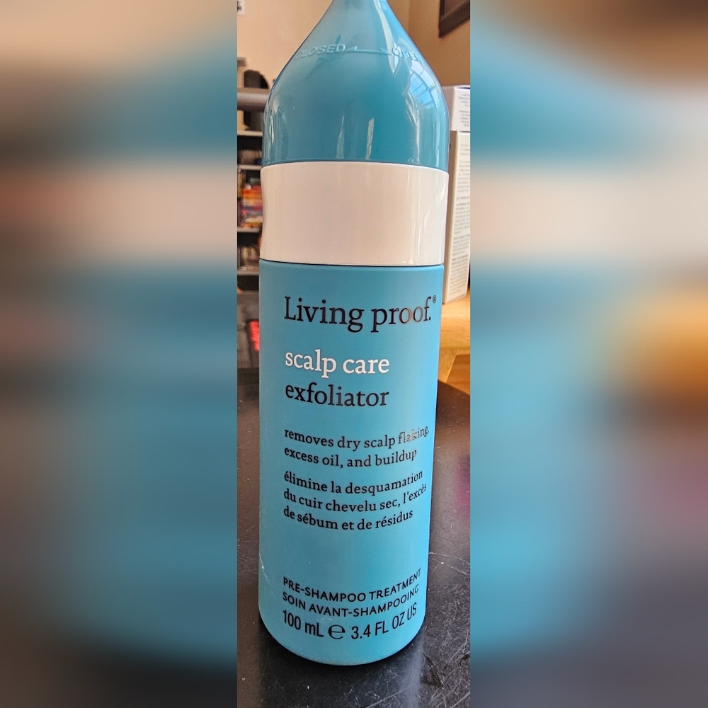 Living Proof Scalp Care Exfoliator in Blue and White
